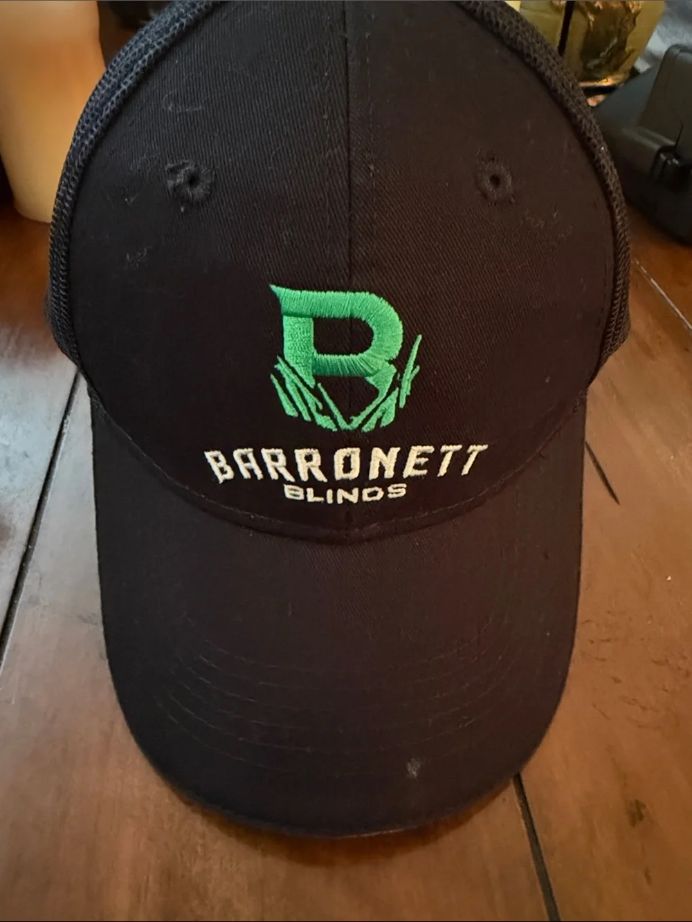 Black Cap with Green Embroidered Logo